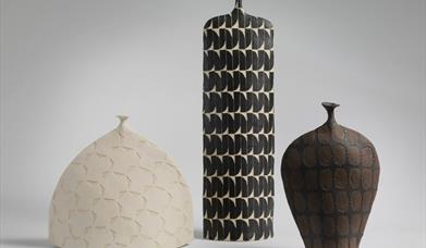 Björk Haraldsdóttir, Various Vessels, (Winter Moss, Raven, Tapestry) White Stoneware, Black Slip / Black Stoneware, Black Slip, Red Glaze Photo: Messu