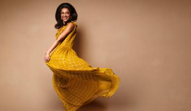 Sindhu Vee in yellow dress